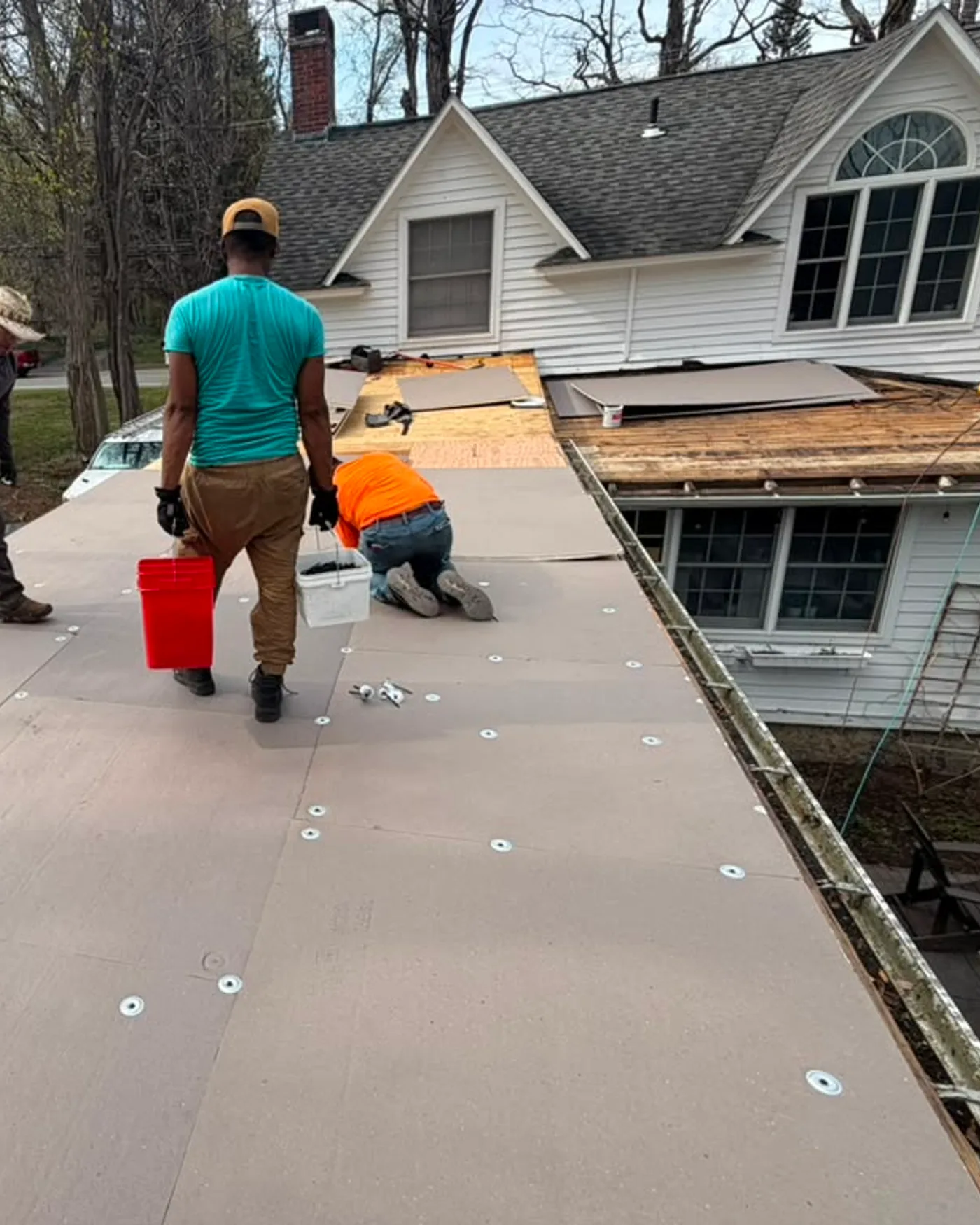 The ART ROOFING crew on a residential job in the Capital Region